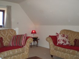 The cosy living room at Butterton Moor Cottage